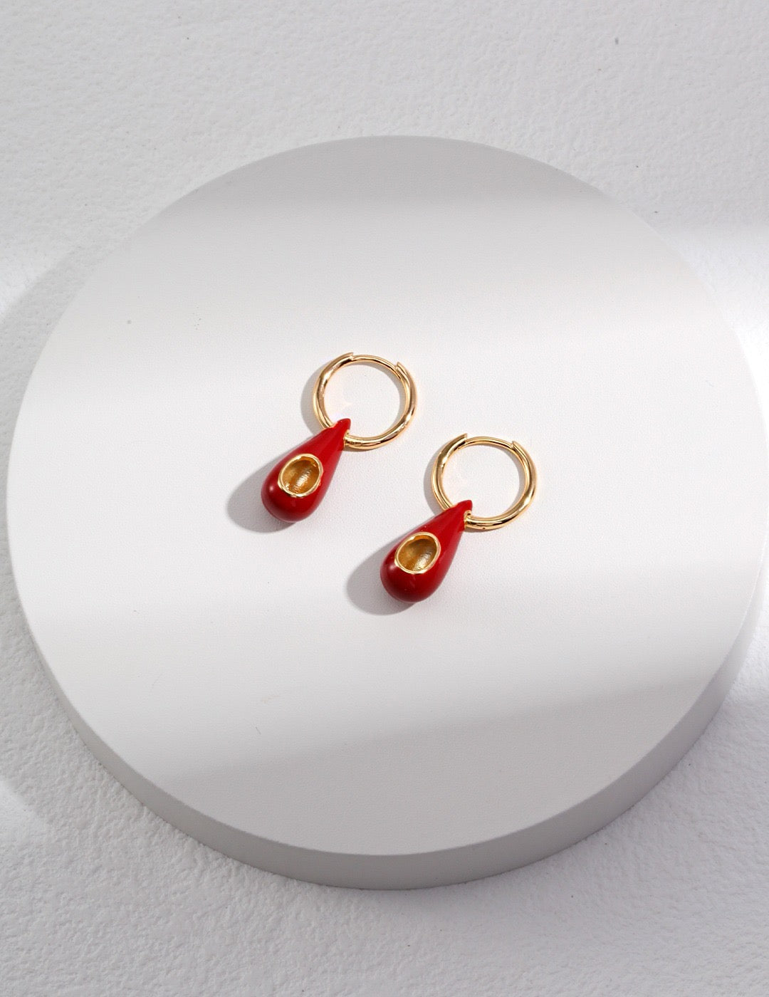 Sterling silver water drop red glaze earrings