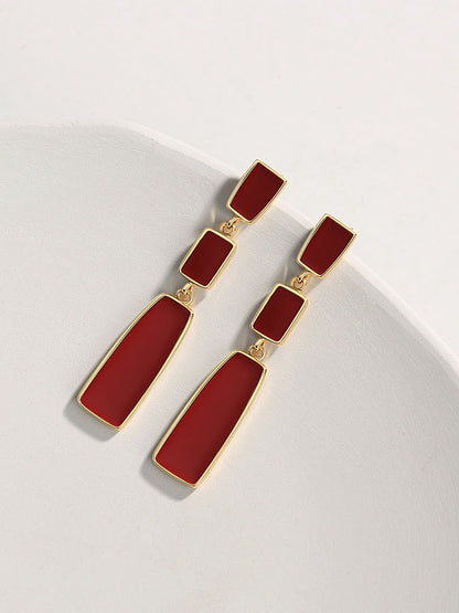 Chinese red uranium drip earrings