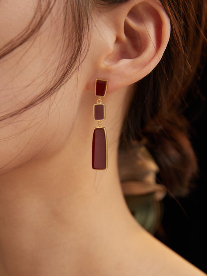 Chinese red uranium drip earrings