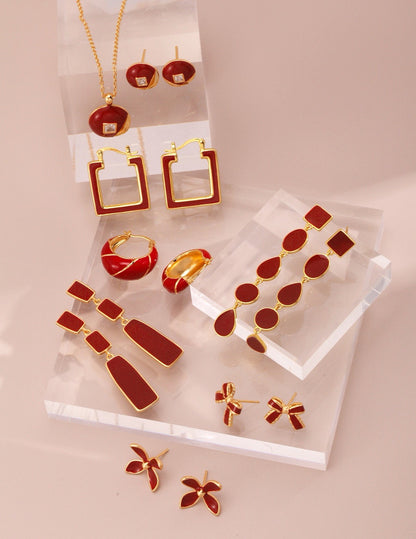 Chinese red uranium drip earrings